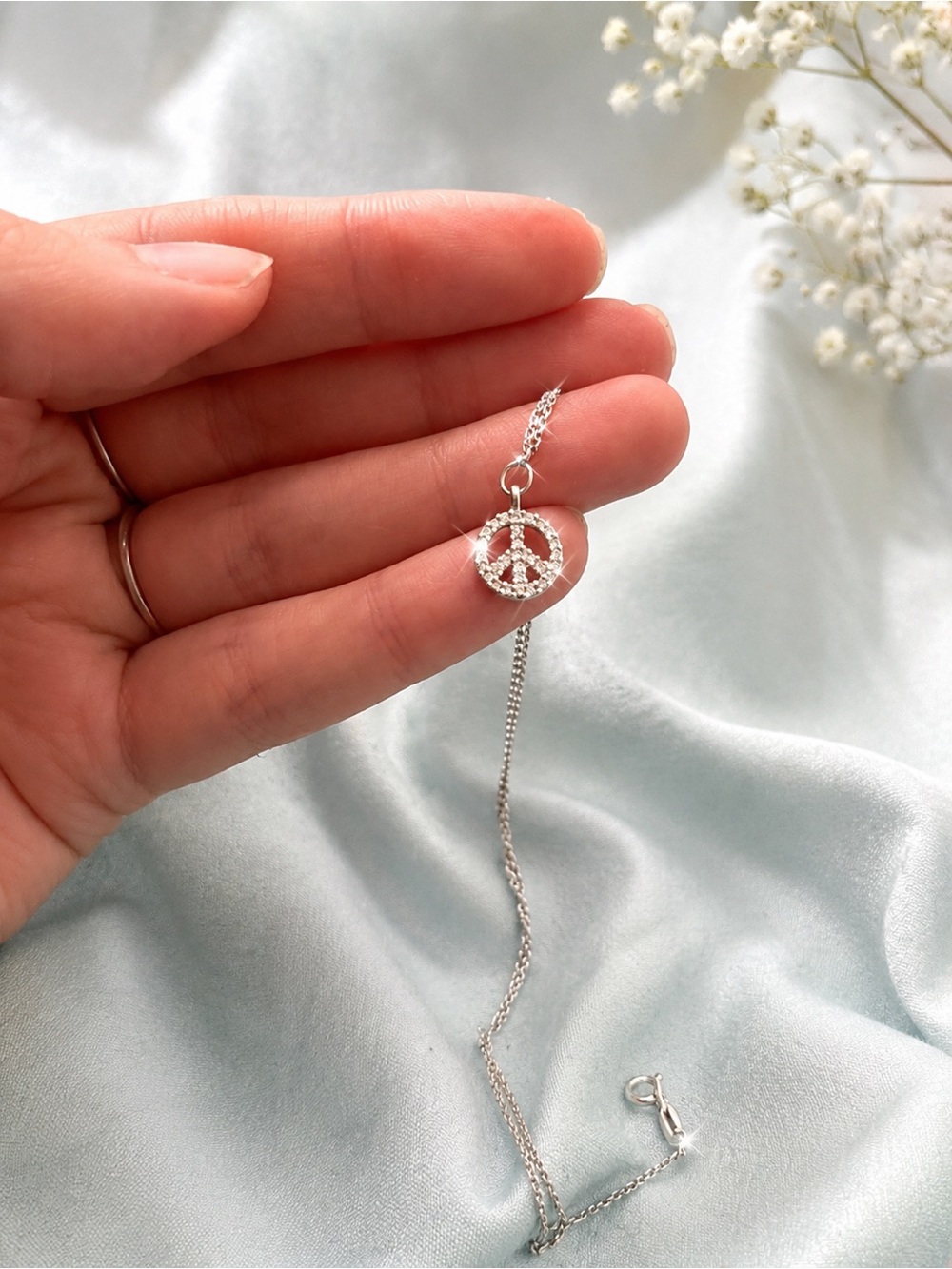 14k white gold diamond peace sign necklace